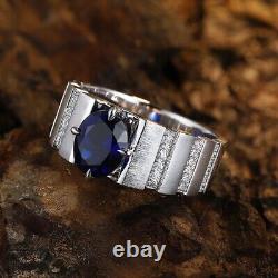 Bague de mariage pour homme en or blanc 14 carats avec solitaire simulé en forme de ovale bleu de 2.70 carats.