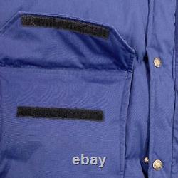 La veste en duvet Brooks Range de The North Face, étiquette marron, re-impression ND-1025, taille bleue utilisée