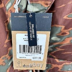 La veste parka pour hommes de The North Face, taille large, 77 Brooks Range, marron camouflage avec capuche.