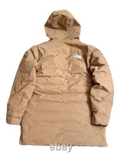 Le manteau parka en duvet The North Face Mountain Range couleur brun tan taille medium pour homme