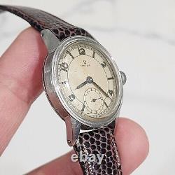 Montre militaire pour hommes Omega vintage WWII Cal. R17.8 des années 1940 Réf 2144 révisée