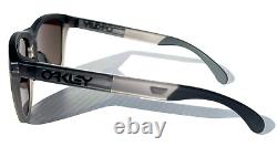 Nouvelle gamme de lunettes de soleil Oakley Frogskins en gris mat fumée avec verres PRIZM Ruby 9284-01